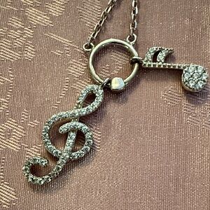 Elegant sterling and cc Silver Music Note Pendant